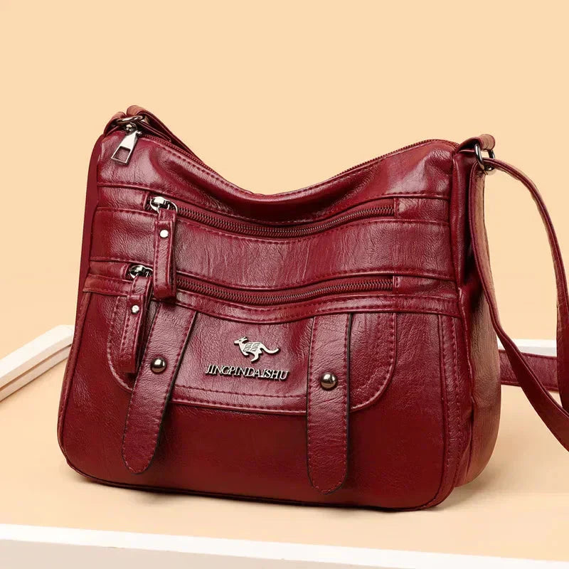 Adele™ – Stilig crossbody-veske med flere rom